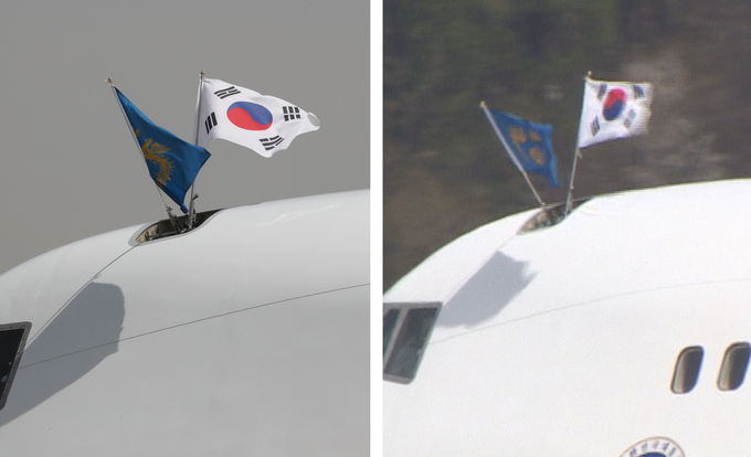 16일 공군 1호기에 거꾸로 걸려있는 태극기 <사진=연합뉴스>