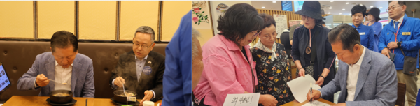 김문수 국회의원과 국밥 먹은 후 시민들에게 싸인 해 주는 정청래 위원장 [사진= 박미라 기자] 